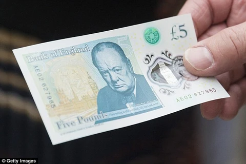 Đồng tiền polymer mệnh giá 5 bảng. (Nguồn: Getty Images)