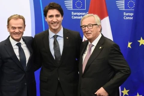 Thủ tướng Canada Justin Trudeau và các nhà lãnh đạo EU tại lễ ký. (Nguồn: Getty Images)