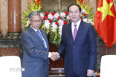 Chủ tịch nước Trần Đại Quang tiếp ông Datuk Seri Mustapa Mohamed, Bộ trưởng Ngoại thương và Công nghiệp Malaysia đang thăm và làm việc tại Việt Nam. (Ảnh: Nhan Sáng/TTXVN)