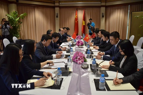 Quang cảnh Phó Thủ tướng, Bộ trưởng Ngoại giao Phạm Bình Minh gặp Bộ trưởng Ngoại giao Trung Quốc Vương Nghị. (Ảnh: Hưng Đa/TTXVN)