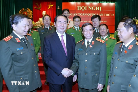 Chủ tịch nước Trần Đại Quang với các lãnh đạo Bộ Công an tham dự Hội nghị. (Ảnh: Nhan Sáng/TTXVN)