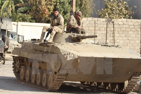 Quân đội Chính phủ Iraq trong cuộc chiến chống IS tại Mosul, Iraq ngày 10/12. (Nguồn: THX/TTXVN)