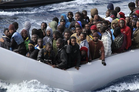 Người di cư tìm cách đến Italy. (Nguồn: NPR)