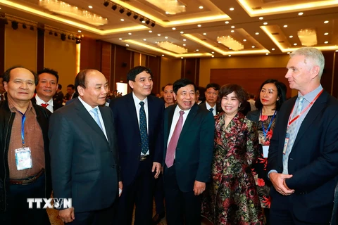 Thủ tướng Nguyễn Xuân Phúc và các đại biểu tham dự hội nghị. (Ảnh: Thống Nhất/TTXVN)
