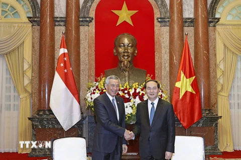 Chủ tịch nước Trần Đại Quang tiếp Thủ tướng Cộng hòa Singapore Lý Hiển Long đang thăm chính thức Việt Nam. (Ảnh: Nhan Sáng/TTXVN)