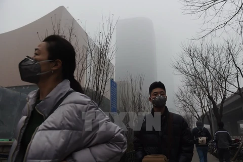 Khói mù ở thủ đô Bắc Kinh, Trung Quốc. (Nguồn: AFP/TTXVN)