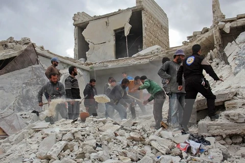 Cảnh đổ nát sau các cuộc không kích tại Syria. (Nguồn: AFP/TTXVN)