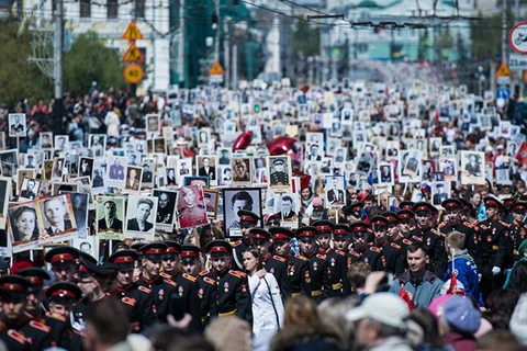 Buổi lễ diễu hành Binh đoàn Bất tử được tổ chức ở nhiều quốc gia trên thế giới. (Nguồn: Sputnik)