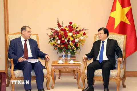 Phó Thủ tướng Chính phủ Trịnh Đình Dũng tiếp Ngài Yuri Sentyurin, Thứ trưởng Bộ Năng lượng Liên bang Nga sang thăm và làm việc tại Việt Nam. (Ảnh: Doãn Tấn/TTXVN)