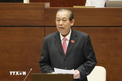 Phó Thủ tướng Thường trực Trương Hòa Bình trả lời chất vấn của Đại biểu Quốc hội. (Ảnh: Phương Hoa/TTXVN)