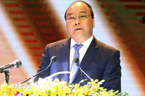 Thủ tướng Nguyễn Xuân Phúc dự và phát biểu tại hội nghị.(Ảnh: Thống Nhất/TTXVN)