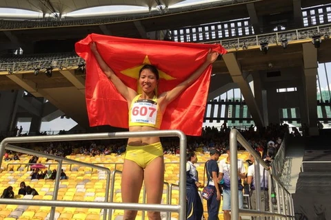 Vận động viên Bùi Thị Thu Thảo giành huy chương vàng ở nội dung nhảy xa tại SEA Games 29. (Nguồn: Thể thao và Văn hóa) 