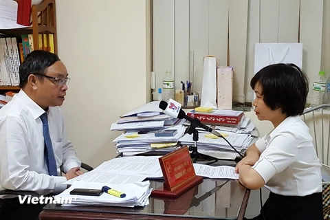 Thẩm phán Trương Việt Toàn trả lời phỏng vấn phóng viên TTXVN. (Ảnh: Nguyễn Cúc/Vietnam+)