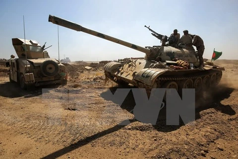 Các lực lượng Iraq trong chiến dịch chống khủng bố. (Nguồn: AFP/TTXVN)