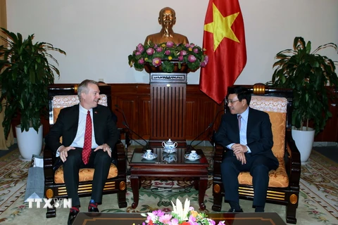 Phó Thủ tướng, Bộ trưởng Bộ Ngoại giao Phạm Bình Minh tiếp Đại sứ Hoa Kỳ tại Việt Nam Ted Osius. (Ảnh: Phạm Kiên/TTXVN)