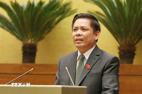 Bộ trưởng Bộ Giao thông Vận tải Nguyễn Văn Thể giải trình, tiếp thu ý kiến của đại biểu Quốc hội. (Ảnh: Phương Hoa/TTXVN)
