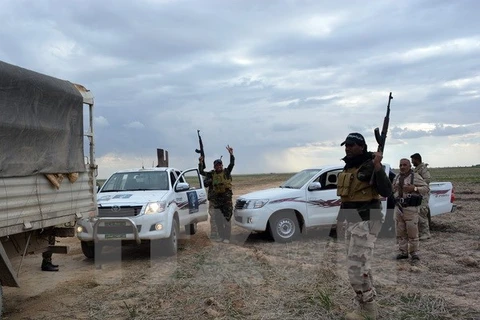 Binh sỹ quân đội Iraq sau khi giành lại một khu vực từ tay IS ở phía bắc tỉnh Diyala. (Nguồn: AFP/TTXVN) 
