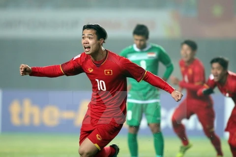 Cầu thủ Công Phượng đội U23 Việt Nam vui mừng sau khi ghi bàn thắng vào lưới đội U23 Iraq. (Ảnh: Hoàng Linh/TTXVN)
