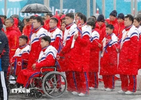 Phái đoàn Triều Tiên đến tham dự Paralympic mùa Đông 2018 tại lễ đón ở làng vận động viên ở PyeongChang, Hàn Quốc ngày 8/3. (Nguồn: Kyodo/TTXVN)