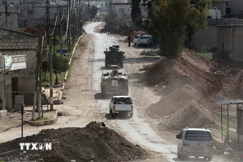 Xe quân sự của quân đội Thổ Nhĩ Kỳ tiến vào thị trấn Afrin ngày 8/3. (Nguồn: THX/TTXVN)