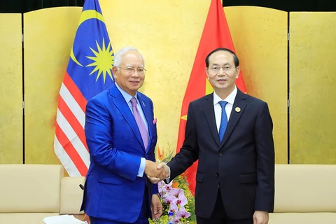 Chủ tịch nước Trần Đại Quang gặp song phương Thủ tướng Malaysia Najib Tun Razak tháng 11/2017. (Nguồn: TTXVN)
