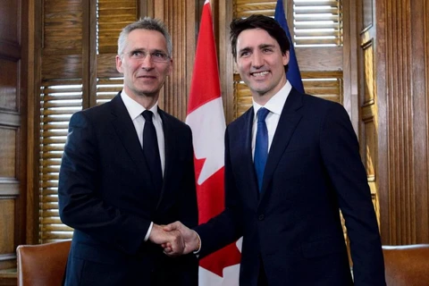 Tổng Thư ký NATO Jens Stoltenberg và Thủ tướng Canada Justin Trudeau. (Nguồn: Canadian Press)