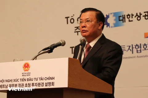Bộ trưởng Đinh Tiến Dũng phát biểu. (Ảnh: Vũ Toàn-Mạnh Hùng-Hữu Tuyên-Trần Phương/Vietnam+)