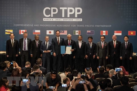 Đại diện các nước tham gia lễ ký Hiệp định CPTPP ở Santiago ngày 8/3. (Nguồn: THX/TTXVN)