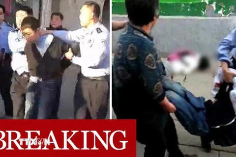 Bắt giữ nghi phạm vụ tấn công bằng dao ở Mễ Chi. (Nguồn: Daily Mail/TTXVN)