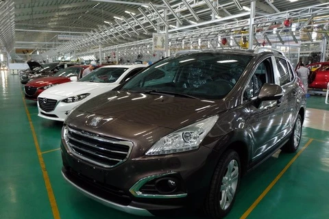 Xe ôtô thành phẩm tại Khu phức hợp sản xuất và lắp ráp ôtô Chu Lai-Trường Hải, Quảng Nam. (Ảnh: Đỗ Trưởng/TTXVN)