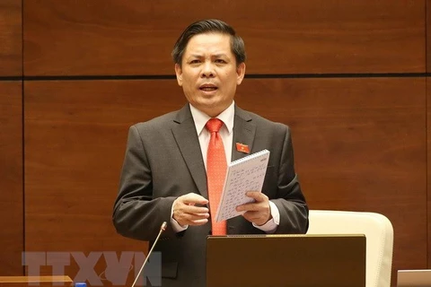 Bộ trưởng Bộ Giao thông Vận tải Nguyễn Văn Thể trả lời chất vấn. (Ảnh: Doãn Tấn/TTXVN)