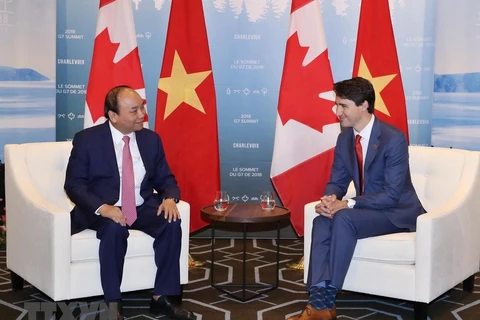 Thủ tướng Nguyễn Xuân Phúc và Thủ tướng Canada Justin Trudeau hội đàm hẹp. (Ảnh: Thống Nhất/TTXVN)