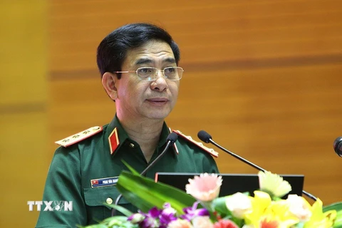 Thượng tướng Phan Văn Giang, Tổng Tham mưu trưởng Quân đội nhân dân Việt Nam, Thứ trưởng Bộ Quốc phòng phát biểu khai mạc hội nghị. (Ảnh: Dương Giang/TTXVN)