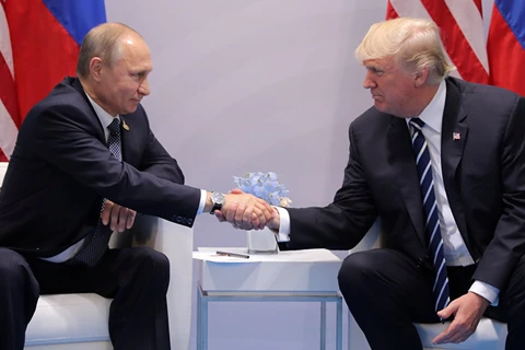 Tổng thống Mỹ Donald Trump (phải) và Tổng thống Nga Vladimir Putin. (Nguồn: Sputnik International)