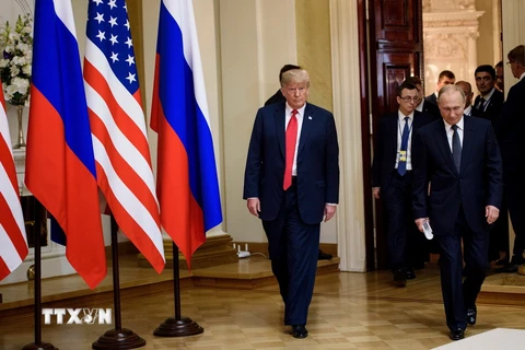 Tổng thống Mỹ Donald Trump (trái) và Tổng thống Nga Vladimir Putin trong cuộc họp báo chung sau hội nghị thượng đỉnh ở Helsinki, Phần Lan ngày 16/7. (Nguồn: AFP/TTXVN)