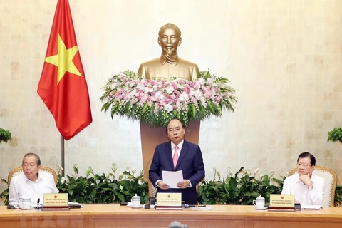 Thủ tướng Nguyễn Xuân Phúc chủ trì Phiên họp Chính phủ thường kỳ tháng 7/2018. (Ảnh: Thống Nhất/TTXVN)