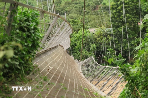 Cầu treo Hải Sơn ở bản Hải Sơn, xã Chiềng Khoong, Sông Mã, Sơn La bị sự cố tụt dây cáp. (Ảnh: Lê Hữu Quyết/TTXVN)