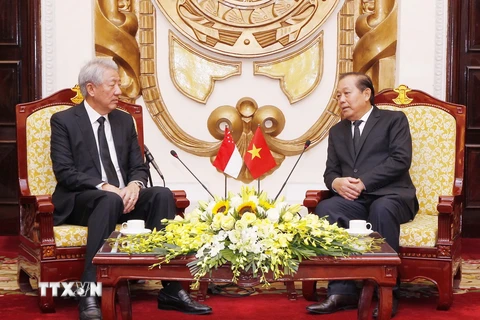 Phó Thủ tướng Thường trực Trương Hòa Bình tiếp Phó Thủ tướng Singapore Tiêu Chí Hiền. (Ảnh: Lâm Khánh/TTXVN)