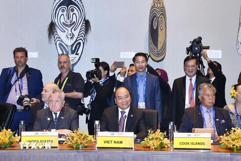 Thủ tướng Nguyễn Xuân Phúc tại cuộc đối thoại giữa các nhà lãnh đạo APEC với lãnh đạo các Quốc đảo Thái Bình Dương. (Ảnh: Thống Nhất/TTXVN)