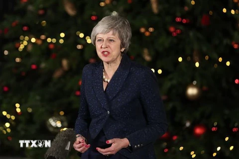 Thủ tướng Anh Theresa May phát biểu tại số 10 phố Downing sau cuộc bỏ phiếu tín nhiệm tại Hạ viện ở London ngày 12/12/2018. (Ảnh: AFP/TTXVN)