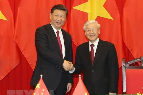 Tổng Bí thư, Chủ tịch nước Nguyễn Phú Trọng và Tổng Bí thư, Chủ tịch nước Trung Quốc Tập Cận Bình. (Ảnh: Trí Dũng/TTXVN)