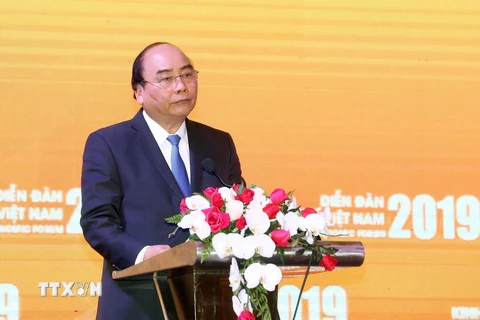 Thủ tướng Nguyễn Xuân Phúc phát biểu bế mạc Diễn đàn. (Ảnh: Thống Nhất/TTXVN)
