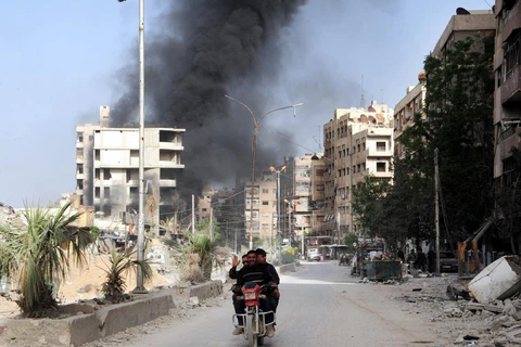 Cảnh đổ nát ở Douma, Đông Ghouta sau xung đột ngày 18/4. (Ảnh: THX/ TTXVN)