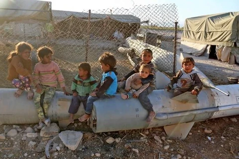 Trẻ em Syria tại trại tị nạn Ashari, khu vực Đông Ghouta. (Nguồn: AFP/TTXVN)