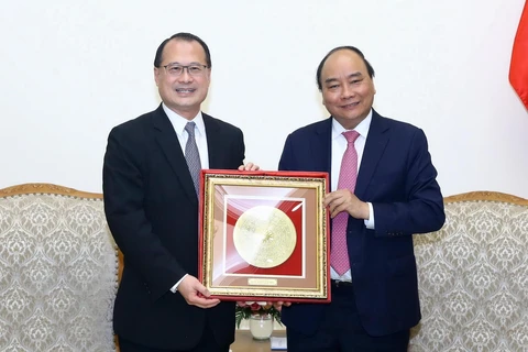 Thủ tướng Nguyễn Xuân Phúc tiếp ông Jonathan Choi, Chủ tịch Phòng Thương mại Hong Kong-Việt Nam. (Ảnh: Thống Nhất/TTXVN)