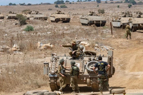 Binh sỹ Israel tham gia huấn luyện trên vùng đất chiếm đóng của Cao nguyên Golan tháng 8/2018. (Nguồn: THX/TTXVN)