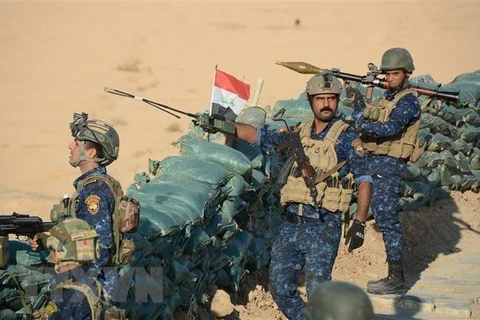 Các lực lượng Iraq làm nhiệm vụ trong chiến dịch truy quét IS. (Nguồn: AFP/TTXVN)