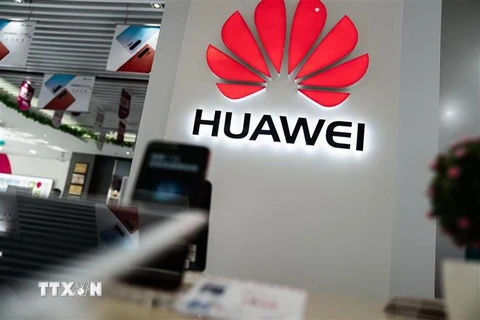 Biểu tượng Huawei tại một cửa hàng ở Bắc Kinh, Trung Quốc, ngày 20/5/2019. (Ảnh: AFP/TTXVN)