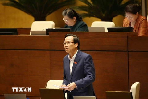 Bộ trưởng Bộ Lao động-Thương binh và Xã hội Đào Ngọc Dung giải trình làm rõ ý kiến của Đại biểu Quốc hội. (Ảnh: Phương Hoa/TTXVN)