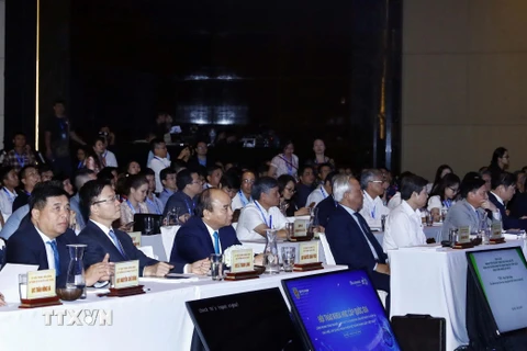Thủ tướng Nguyễn Xuân Phúc dự Hội thảo khoa học cấp quốc gia về vấn đề pháp lý trong cách mạng 4.0. (Ảnh: Thống Nhất/TTXVN)